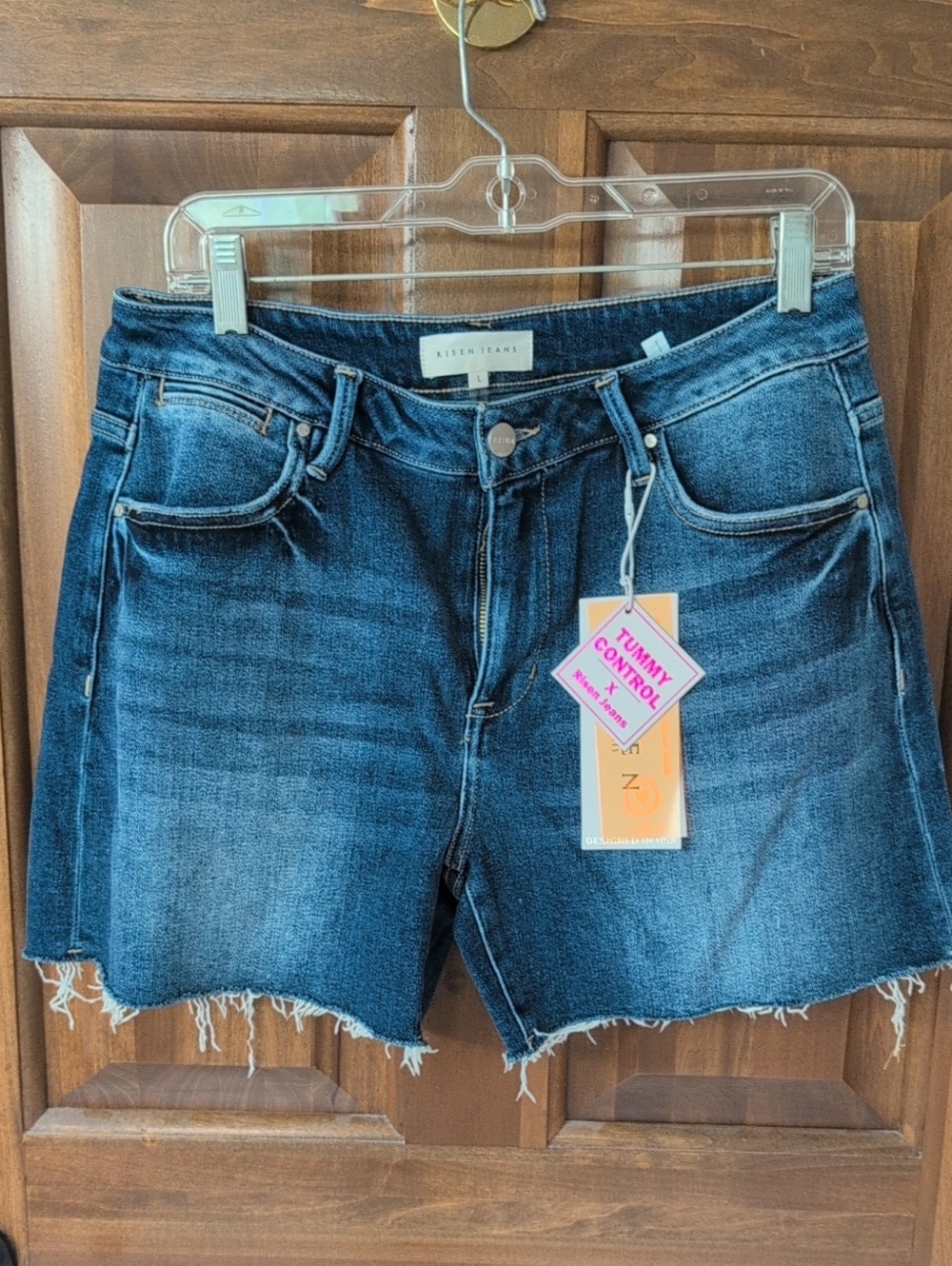 High-Rise Dark Blue Jean Shorts with Frayed Hem